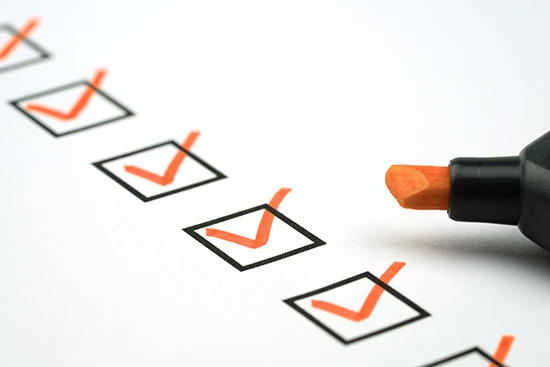 A close view of checkboxes with orange checkmarks